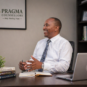 Male counsellor at Pragma Counsellors in a professional office providing mental health counselling