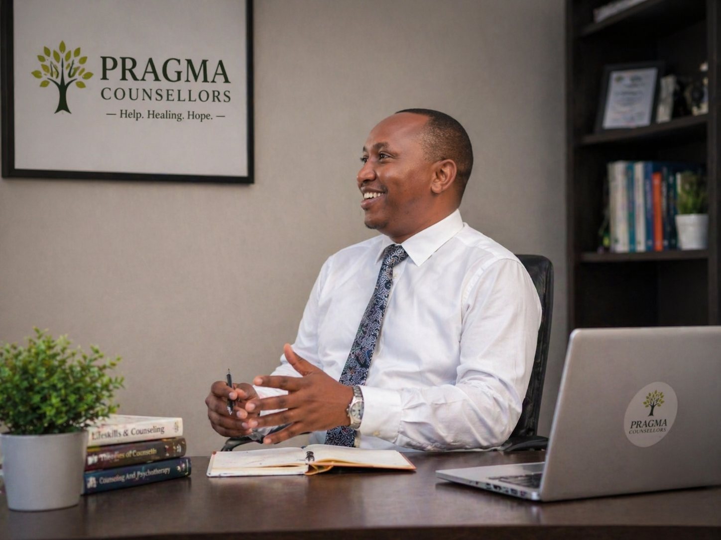 Male counsellor at Pragma Counsellors in a professional office providing mental health counselling
